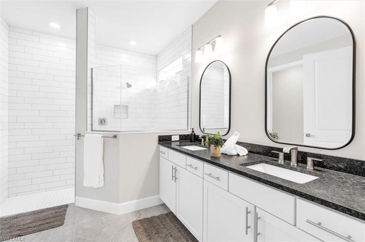 Double sinks and ample storage in primary bath