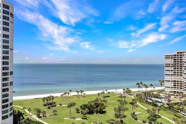 Watch the waves gently roll up to the white sands of the Naples Beach.