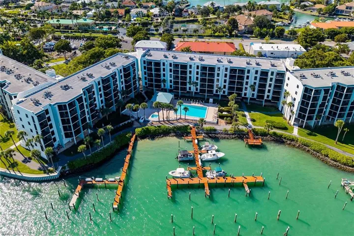 Aerial view of a large body of water and apartment complex
