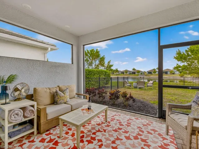 Covered screened lanai overlooking the lake—perfect for relaxing or entertaining.