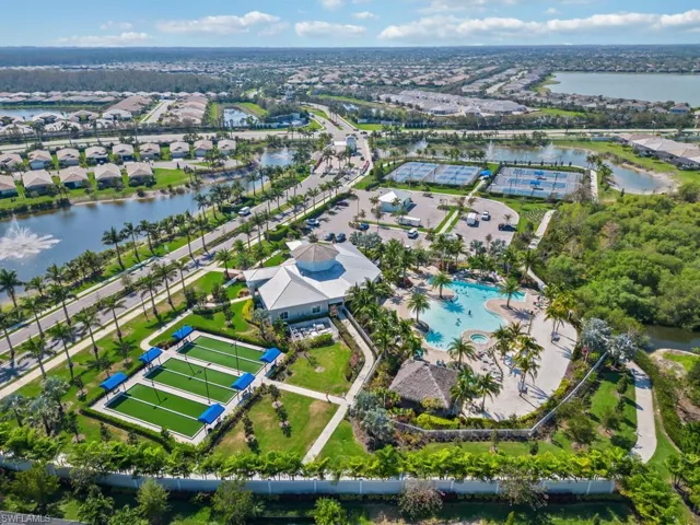 Resort-style community amenities featuring bocce ball courts and tiki hut.