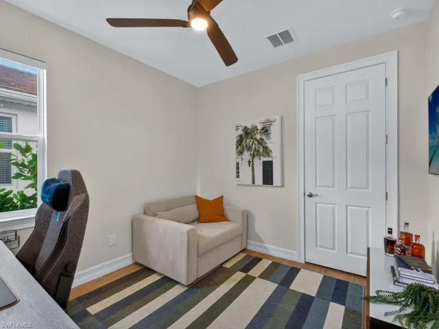Versatile den /bedroom with French doors—ideal for a home office or flex space.