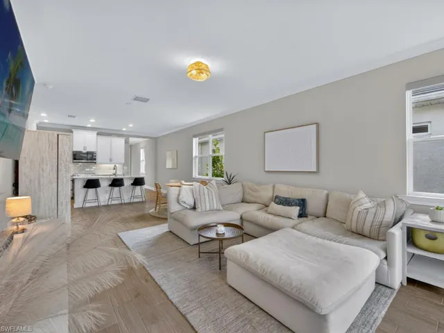 Bright and airy living space with seamless flow.