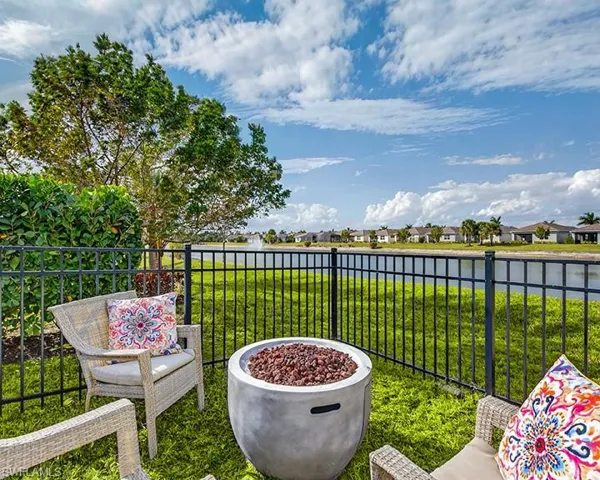 Private fenced backyard overlooking the peaceful lake.