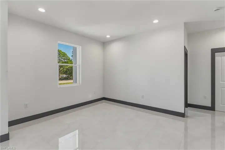 Spare room with recessed lighting