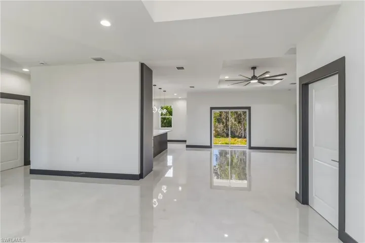Spare room featuring recessed lighting and a ceiling fan