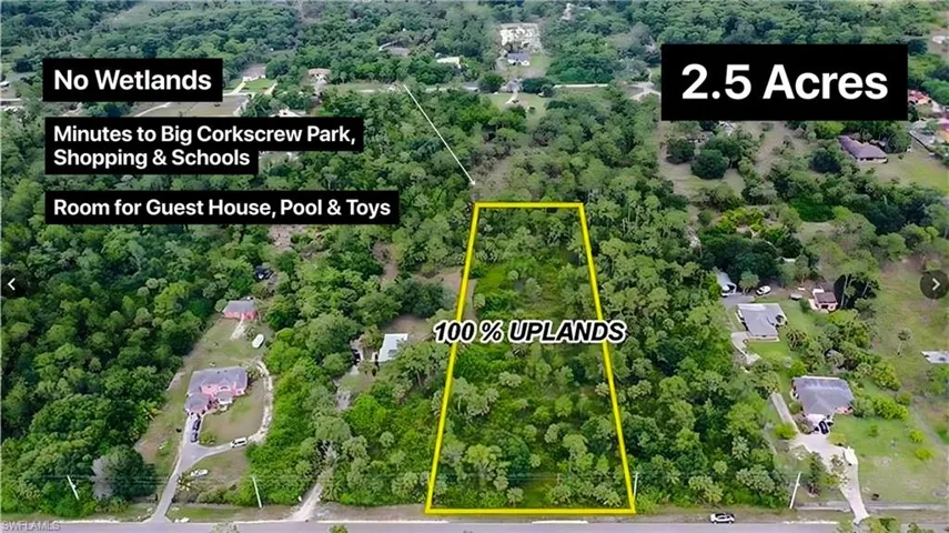 Aerial view of property and surrounding area with property parcel outlined