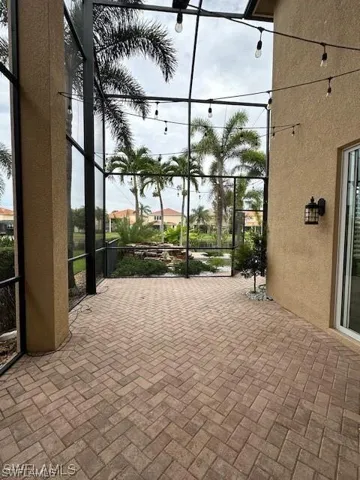 Unfurnished sunroom with a  screened patio