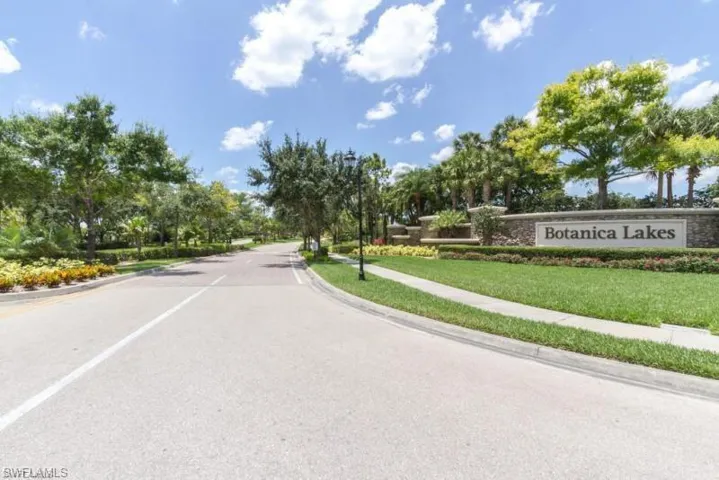 View of asphalt street with sidewalks and curbs
