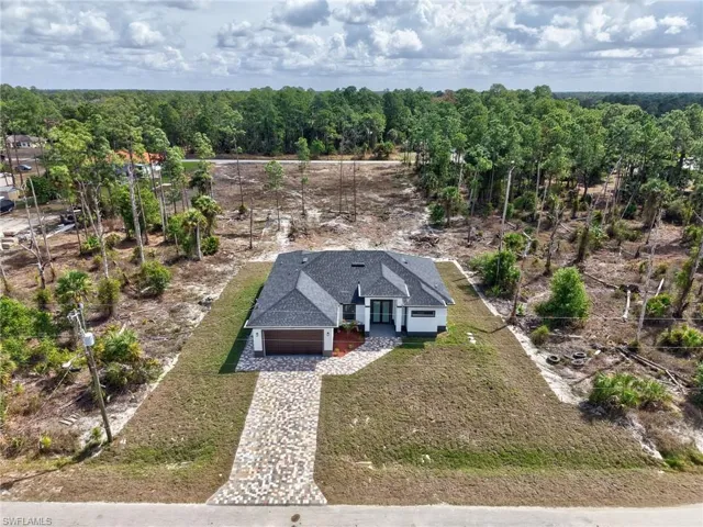 Aerial view of property and surrounding area