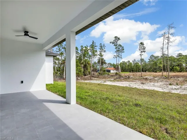 View of patio with ceiling fan