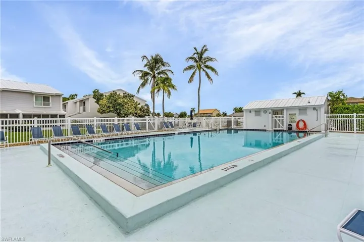 View of pool with an outbuilding