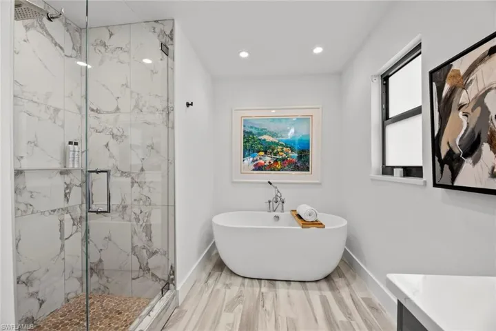 Large step in shower, free standing tub