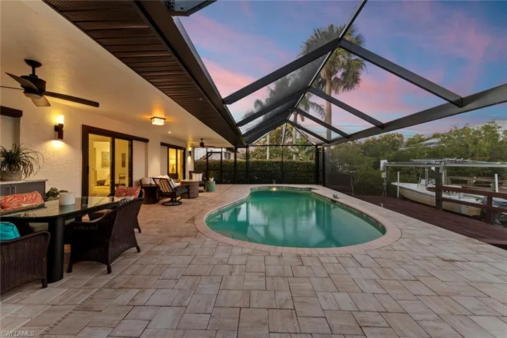 Enjoy a dip in the pool as the sun goes down