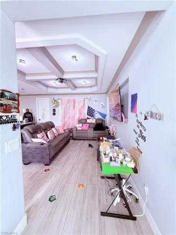 Recessed ceiling featuring multi-level tray design with integrated lighting