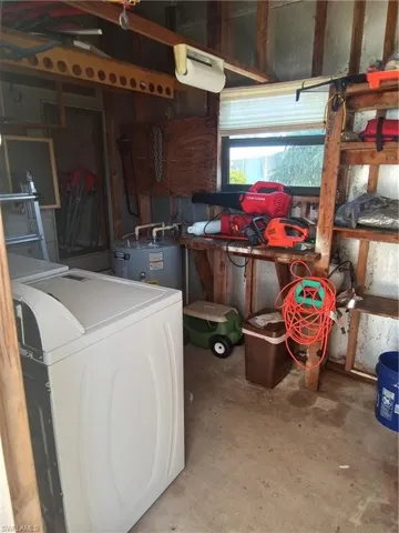 Shed interior w/washer, dryer & hot water heater
