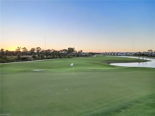 View of property's community featuring golf course view and a water view