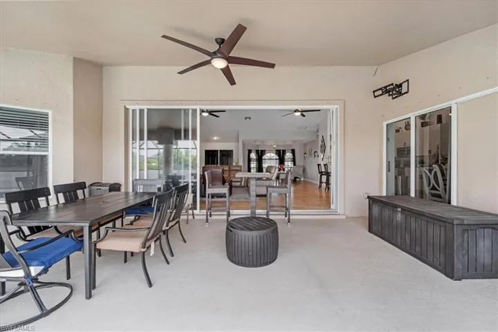 View of patio / terrace with a ceiling fan and outdoor dining space