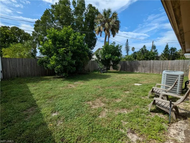 View of yard with central AC