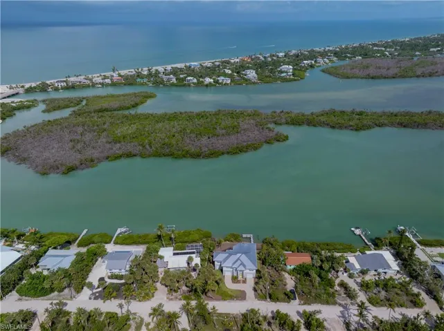 Aerial view of residential area with a nearby body of water