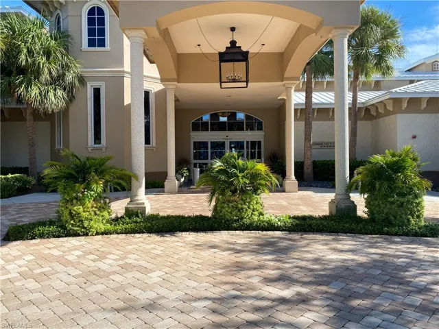Property entrance with stucco siding