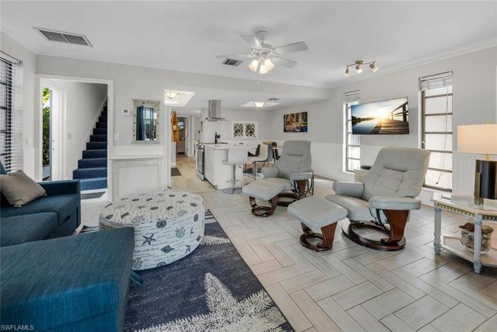 Beachy vibe Living Open to Kitch/Dining West unit.