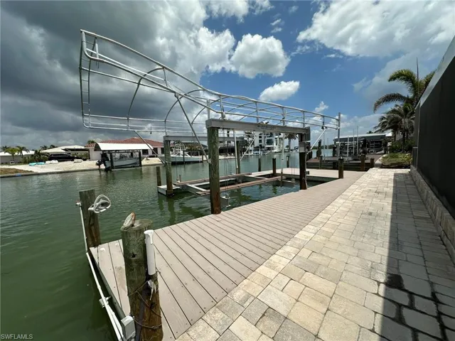 Dock, deep water canal, 120'+ WIDE, Matanzas Pass is in background.