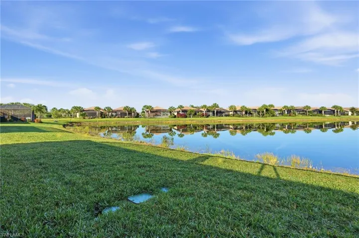Water view featuring nearby suburban area