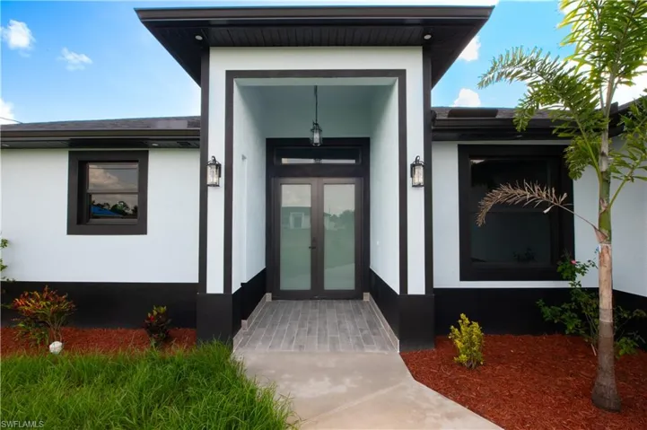 View of exterior entry with french doors