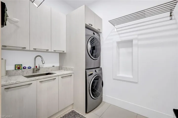 Oversized with sink and hanging shelves.