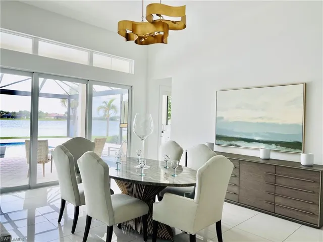 Tiled dining area with a water view