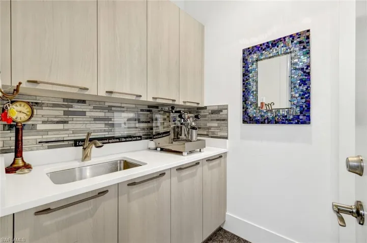 Prep area off kitchen for caterers or staff.