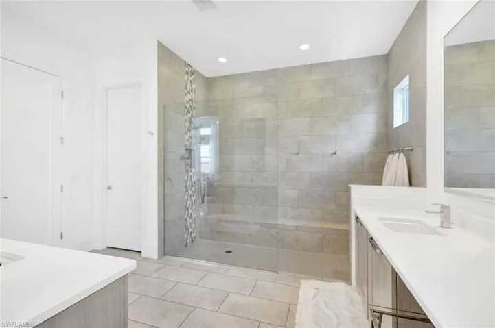 Primary bath spacious shower and Toto toilet
