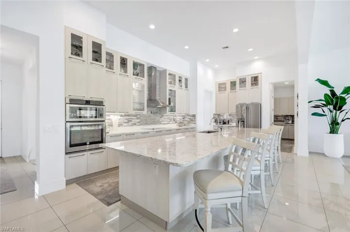 With custom cabinets and 12 ft ceilings!