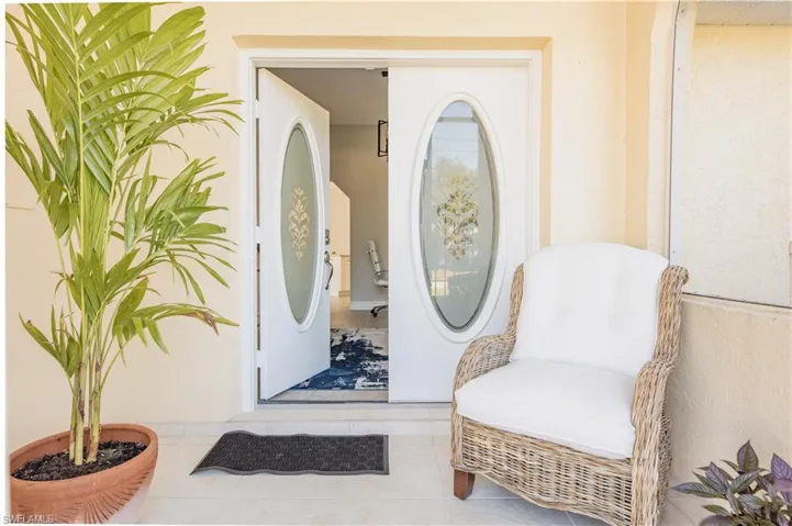 Screened front entry courtyards