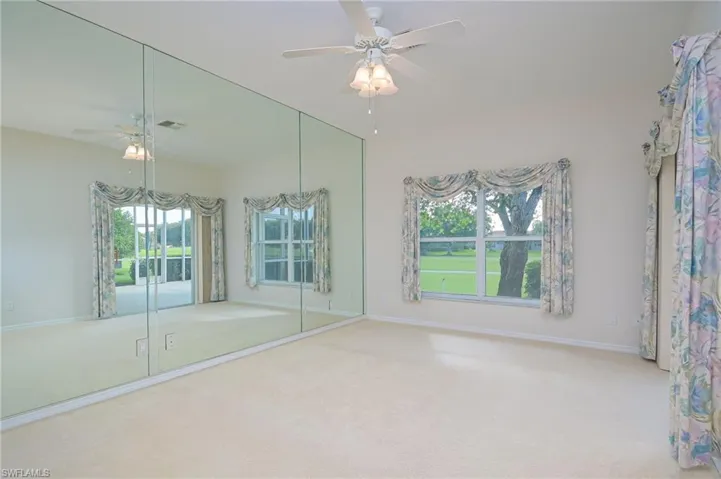Shown without furnishings. Views of golf course, direct entry to lanai area.