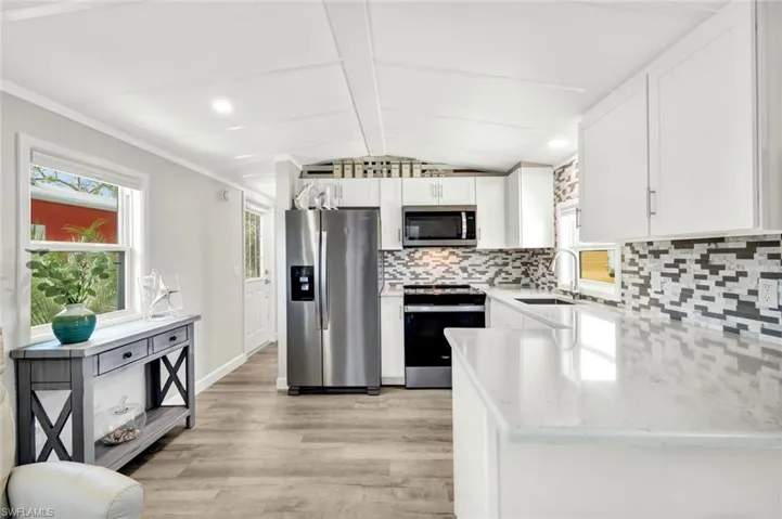View of kitchen from living area.
