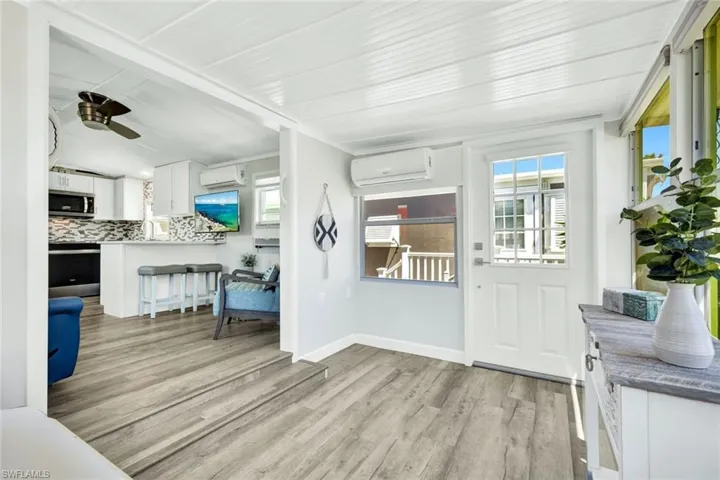 View of main living area from enclosed porch.