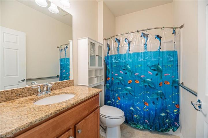 Guest bathroom with handicapped accessible tub