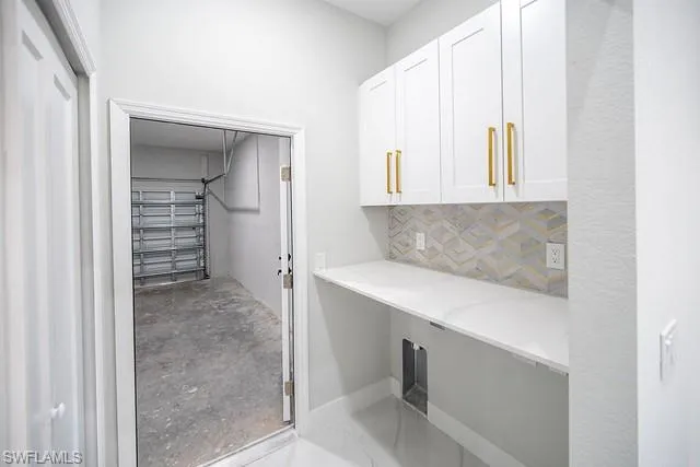 Laundry room with cabinet space