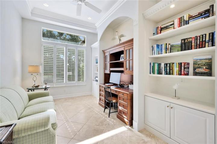 Den/office with tray ceiling and moldings