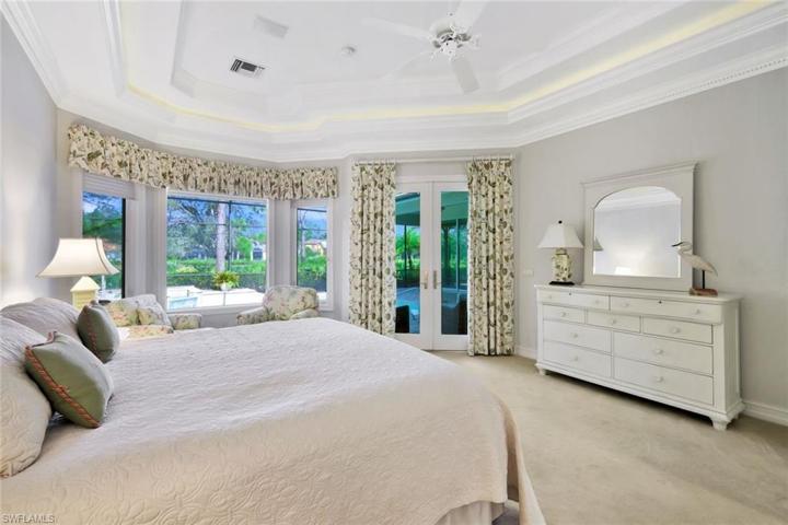 Striking ceiling treatment in owner's bedroom