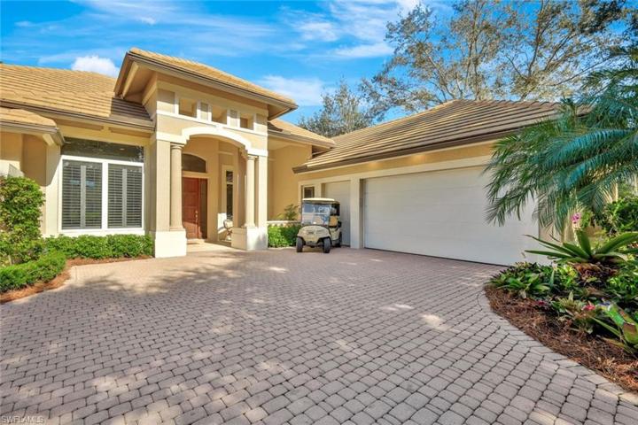 Attractive curb appeal w/ front porch & side-entry double-car + golf cart garage