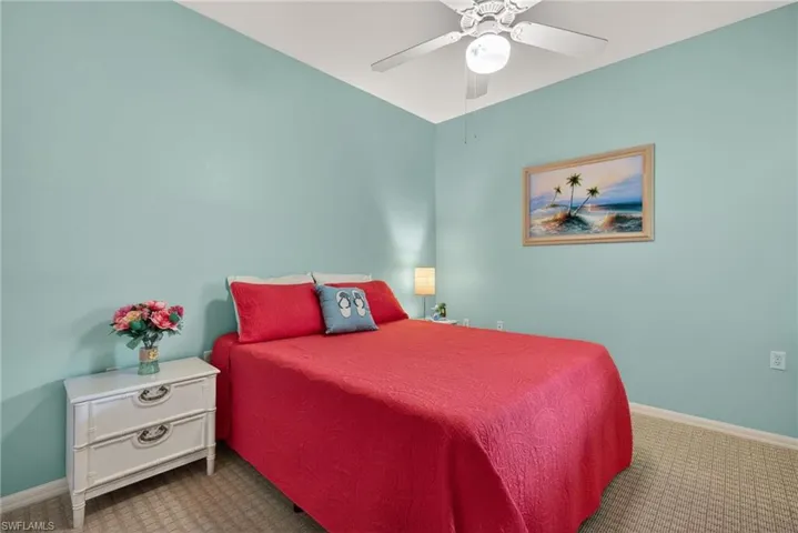 Bedroom featuring carpet floors and ceiling fan