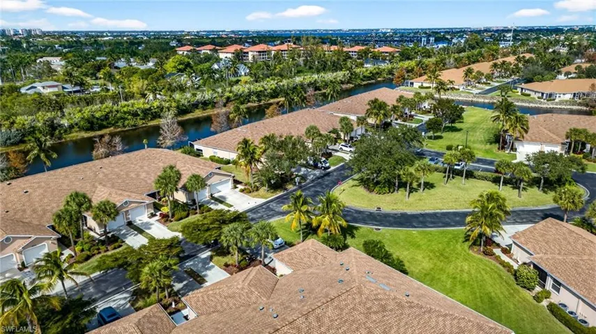Aerial view of residential area with a nearby body of water