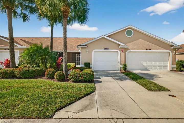 Single story home with stucco siding, concrete driveway, and a garage