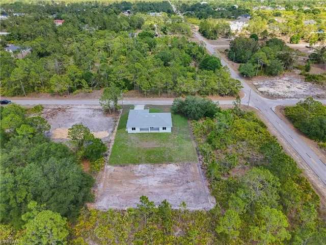 Aerial view with a wooded view