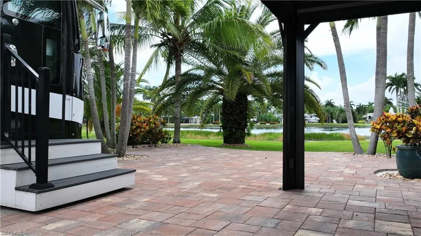 View of patio / terrace with a water view