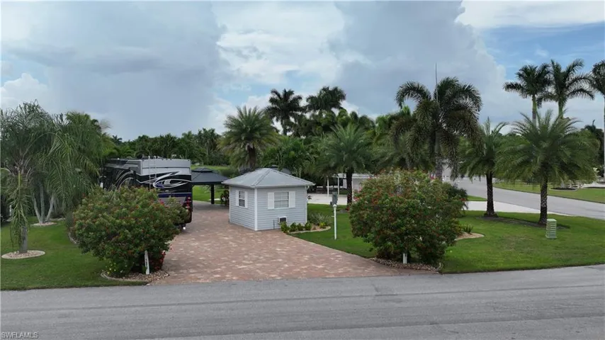 View of front of home featuring a front lawn