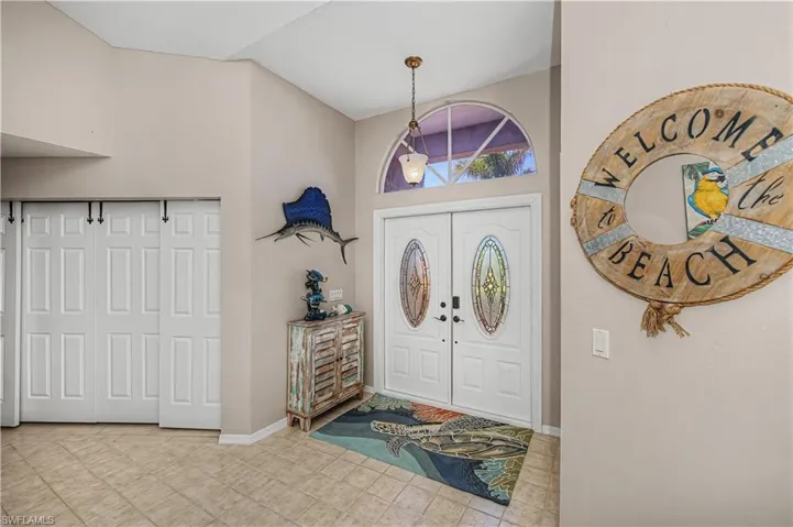Foyer featuring baseboards